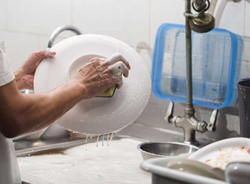 person-washing-dish